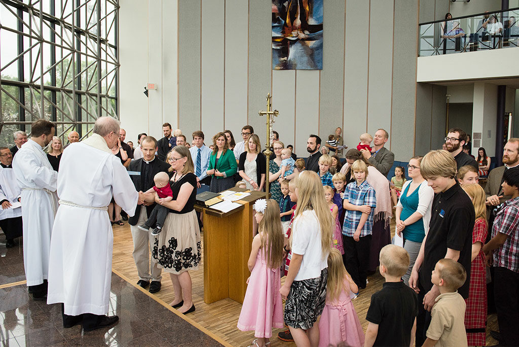 New LCMS missionaries and their families are welcomed during a sending service in July 2015. The Synod's Board for International Mission approved a total of 22 — men and women, clergy and laity — for missionary service during its final meeting of the triennium, May 19-20, 2016, in St. Louis. (LCMS/Erik M. Lunsford)