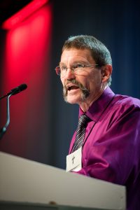 The Rev. Terry Forke, chairman of Floor Committee 14 on Church and Culture and president of the LCMS Montana District, addresses the 66th Regular Convention of The Lutheran Church—Missouri Synod. (LCMS/Michael Scheurmann)