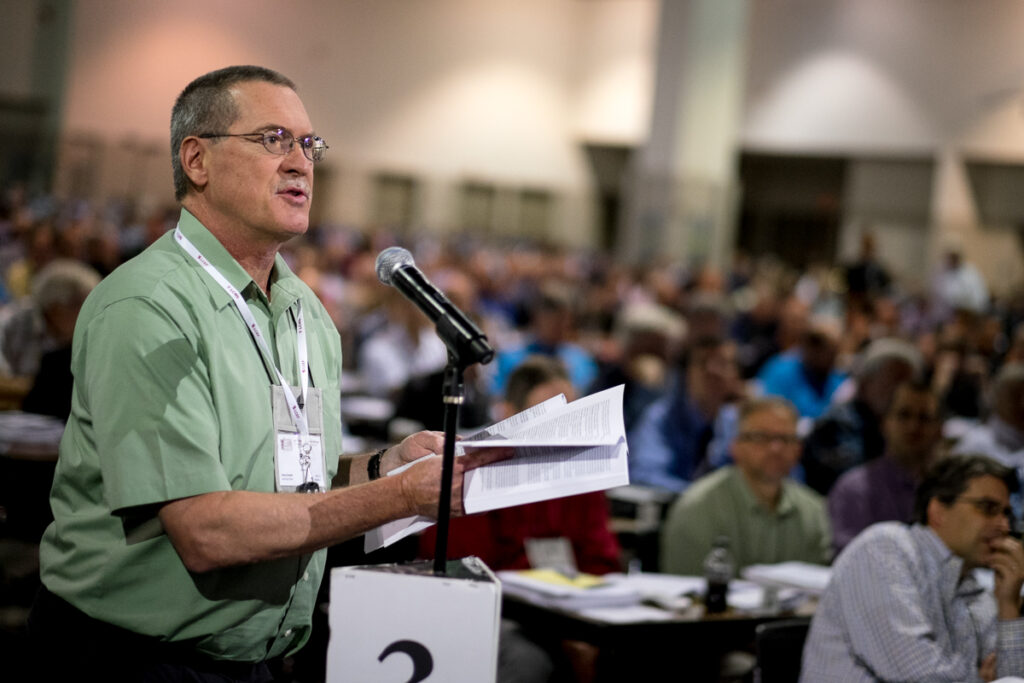 Richard Emory, a lay delegate from Davenport, Iowa, addresses Floor Committee 12 on Ecclesiastical Supervision and Dispute Resolution on Tuesday, July 12, during the LCMS convention in Milwaukee. (LCMS/Michael Schuermann)