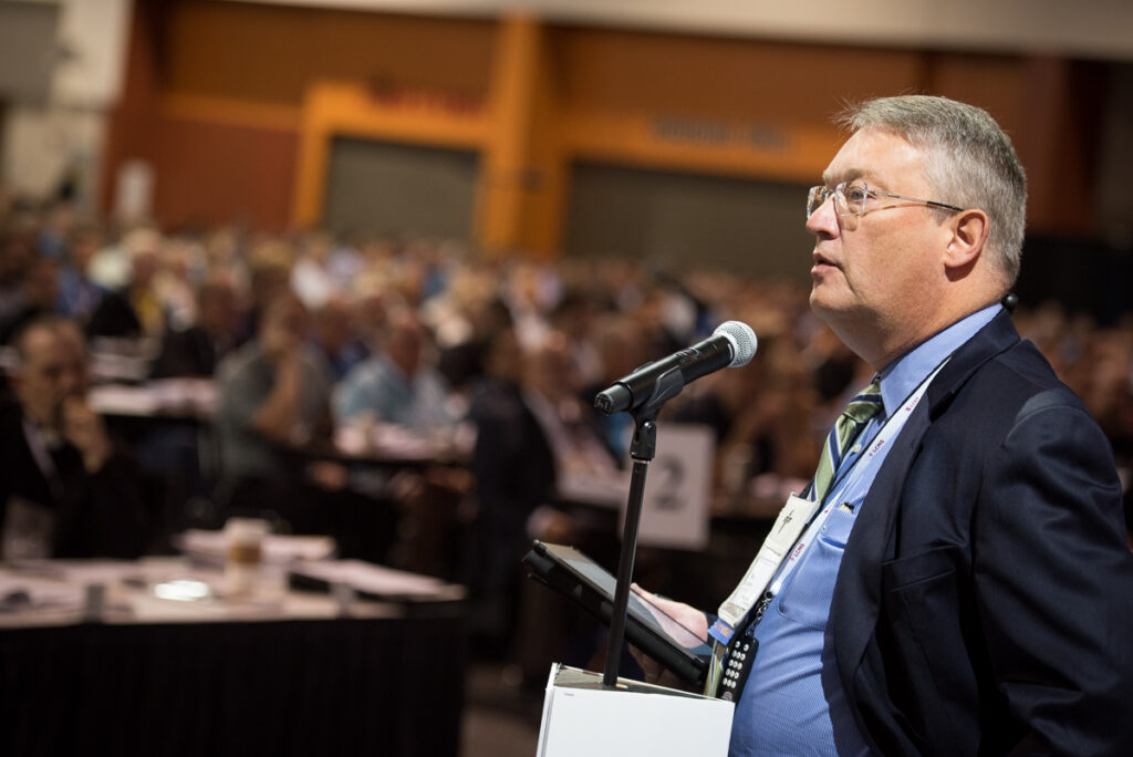 LCMS Northwest District President Rev. Dr. Paul Linnemann addresses the LCMS convention on Wednesday, July 13, 2016, about a particular ecclesiastical-supervision case “that has drawn a lot of attention” in the Synod over the past few years and one in which he was “directly involved.” (LCMS/Michael Schuermann)