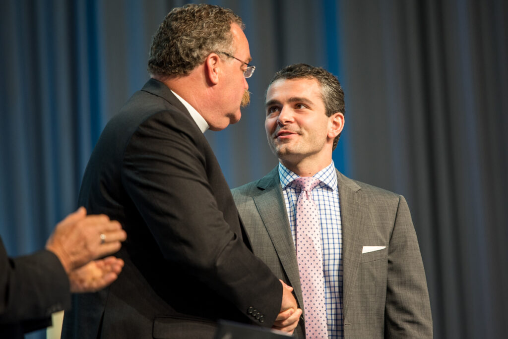 The Rev. Dr. Matthew C. Harrison, president of the LCMS, greets Dr. Ryan Anderson, author of the book "Truth Overruled: The Future of Marriage and Religious Liberty," after Anderson spoke on Monday, July 11, 2016, at the 66th Regular Convention of The Lutheran Church–Missouri Synod in Milwaukee. (LCMS/Frank Kohn)