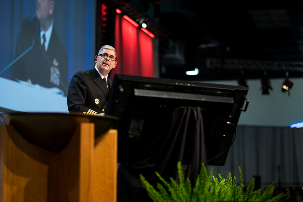 Capt. Gregory N. Todd, a chaplain for the U.S. Coast Guard, presents a resolution for Floor Committee 2 on International Witness during the July 12 session of the Synod's 66th Regular Convention in Milwaukee. (LCMS/Michael Schuermann)