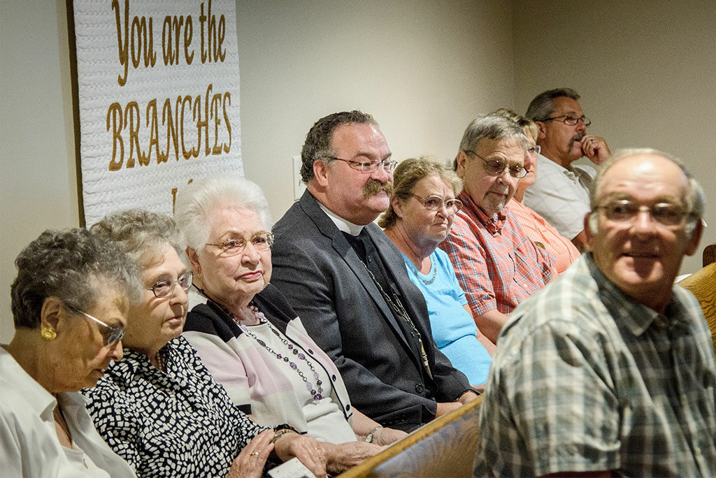 LCMS President Rev. Dr. Matthew C. Harrison sits among members and visitors at St. John’s Lutheran Church in Pilger, Neb., during the morning service Aug. 28, which included the dedication of the church’s new sanctuary. Harrison preached during the afternoon service, which celebrated the church’s 101st anniversary. (LCMS/Frank Kohn)