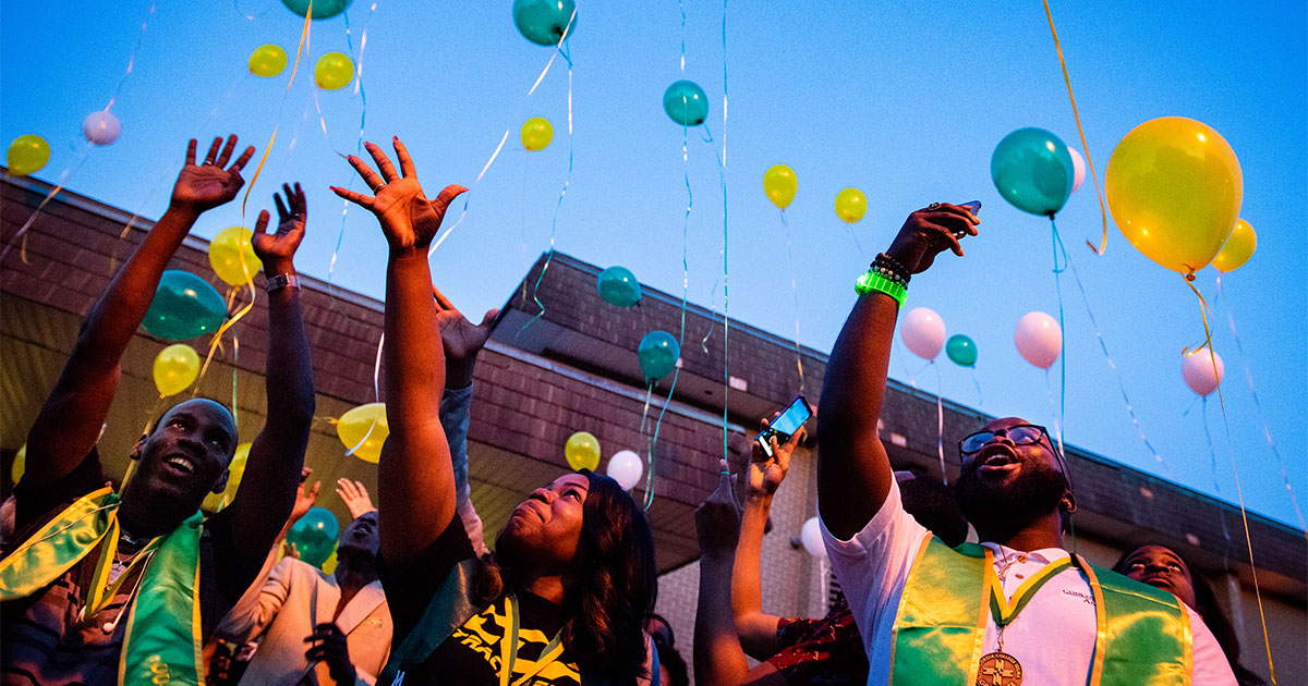 Concordia College Alabama students (from left) Wendy Thoby, Kiana Gay and Linzell Tucker release balloons on Friday, April 27, following the Legacy/Candlelight service that was held in thanksgiving for the college’s 96 years of service in Selma, Ala. (LCMS/Erik M. Lunsford)