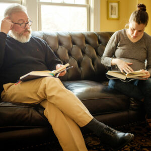 The Rev. David Kind, pastor of University Lutheran Chapel, prepares for afternoon prayer with LCMS national missionary Rebecca Wagner on Feb. 21, 2018, at the Luther House near the University of Minnesota in Minneapolis. (LCMS/Erik M. Lunsford)