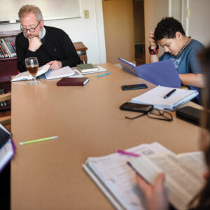 The Rev. David Kind, pastor of University Lutheran Chapel, conducts confirmation class on Feb. 21, 2018, for University of Minnesota students at the Luther House in Minneapolis. (LCMS/Erik M. Lunsford)