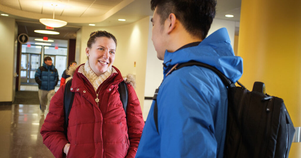 LCMS national missionary Rebecca Wagner talks with Juncheng, a Chinese student studying philosophy, on Feb. 21, 2018, at the University of Minnesota in Minneapolis. Wagner serves alongside the Rev. David Kind at University Lutheran Chapel and focuses on outreach to international students. (LCMS/Erik M. Lunsford)