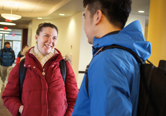 LCMS national missionary Rebecca Wagner talks with Juncheng, a Chinese student studying philosophy, on Feb. 21, 2018, at the University of Minnesota in Minneapolis. Wagner serves alongside the Rev. David Kind at University Lutheran Chapel and focuses on outreach to international students. (LCMS/Erik M. Lunsford)