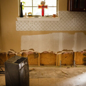 A stained glass cross in the family home of the Rev. Randy Blankschaen, pastor of Immanuel Lutheran Church, Pensacola, Fla., on Tuesday, Sept. 22, 2020. The drywall was removed after their home flooded in the aftermath of Hurricane Sally. LCMS Communications/Erik M. Lunsford