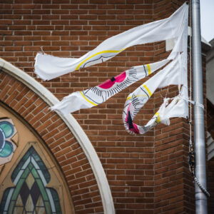 The flag with the Luther seal outside Immanuel Lutheran Church, Pensacola, Fla., is shredded in the aftermath of Hurricane Sally on Tuesday, Sept. 22, 2020. LCMS Communications/Erik M. Lunsford