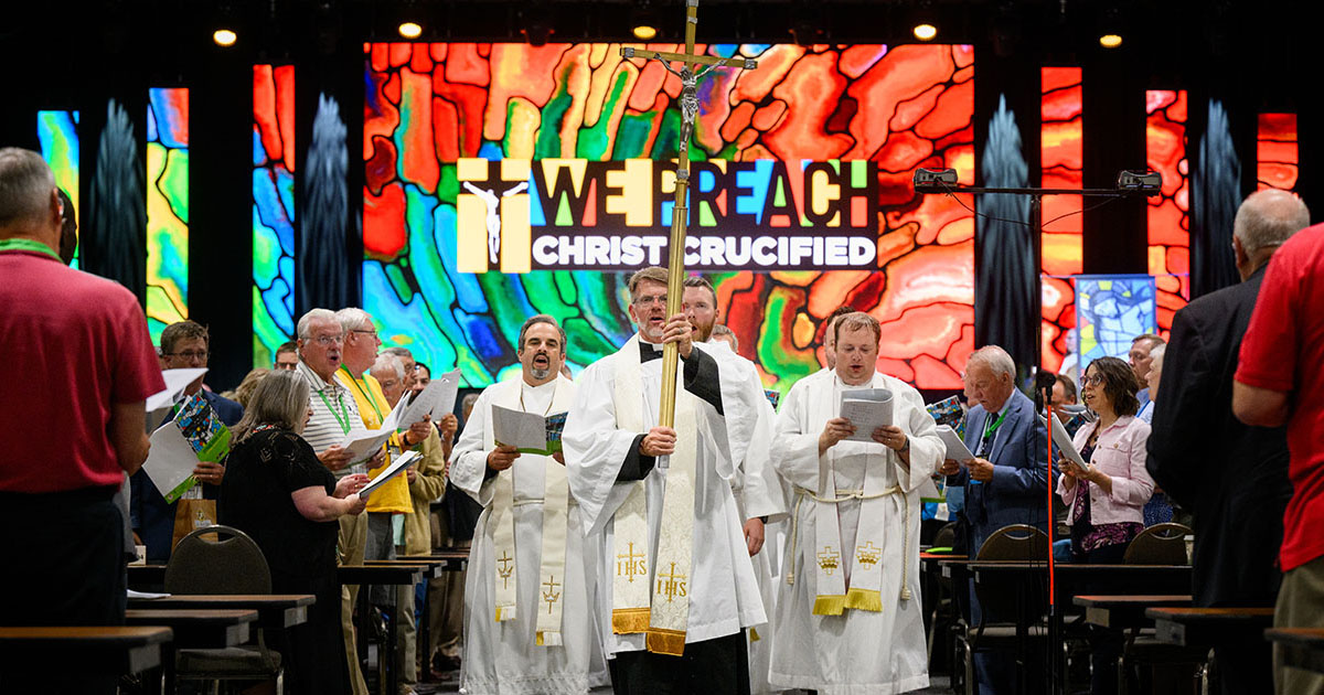 The Rev. M. Douglas Peters, pastor of Trinity Lutheran Church, Milwaukee, leads the recessional following the opening Divine Service of the 68th Regular Convention of The Lutheran Church—Missouri Synod on July 29 at the Baird Center in downtown Milwaukee. (LCMS/Erik M. Lunsford)