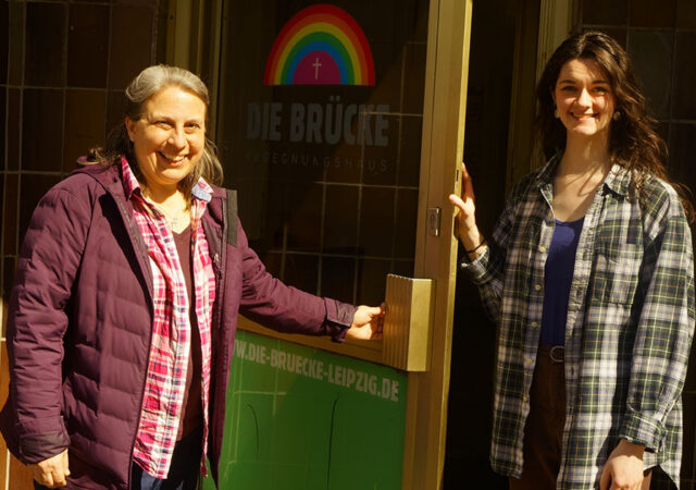 Deaconess Kim Bueltmann (left) and Deaconess Intern Anika Slayton, LCMS missionaries to Germany, stand outside the front door of Die Brücke, a Lutheran mission outreach center in Leipzig. (Photo courtesy of Anika Slayton)