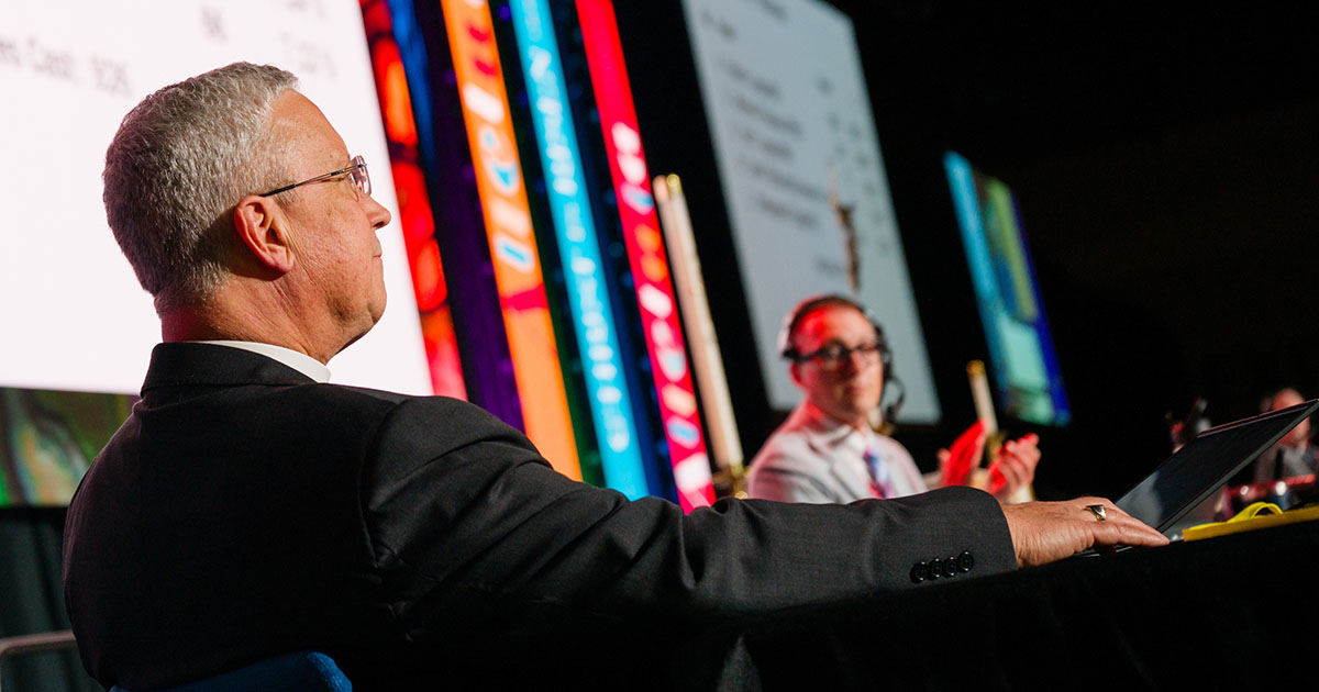 The Rev. Peter K. Lange listens as he is reelected LCMS first vice-president during the 69th Regular Convention of The Lutheran Church—Missouri Synod on July 19. (LCMS/Erik M. Lunsford)