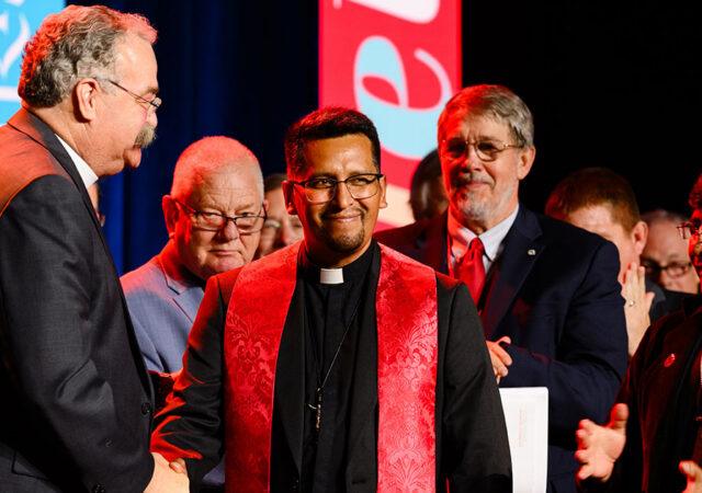 The Rev. Dr. Matthew C. Harrison, LCMS president, shakes hands with President Limberth Fernandez Coronado of the Evangelical Lutheran Christian Church of Bolivia upon declaring altar and pulpit fellowship during the 69th Regular Convention of The Lutheran Church—Missouri Synod on July 21 in Phoenix. (LCMS/Erik M. Lunsford)