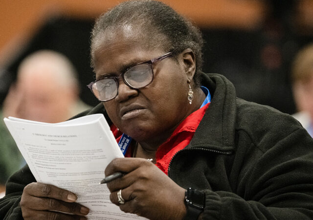 Isabelle Cooper-Browne studies Today’s Business on July 21 during the 69th Regular Convention of The Lutheran Church—Missouri Synod in Phoenix. (LCMS/Frank Kohn)