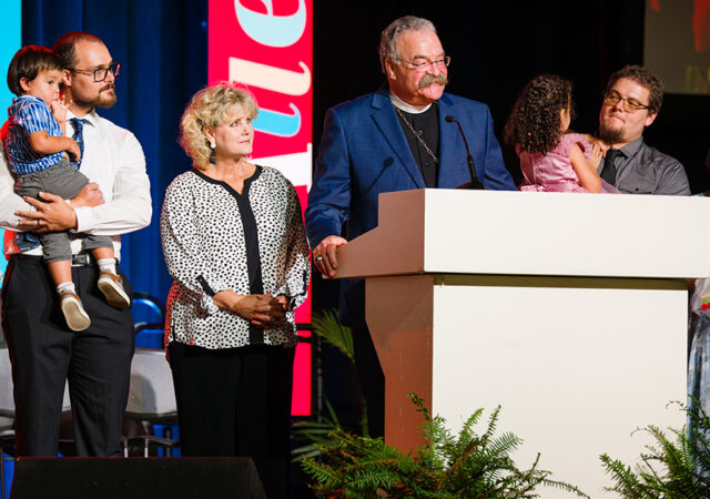The Rev. Dr. Matthew C. Harrison, president of the LCMS, stands with his family during the 69th Regular Convention of The Lutheran Church—Missouri Synod in Phoenix on Sunday, July 19, 2026. LCMS Communications/Erik M. Lunsford