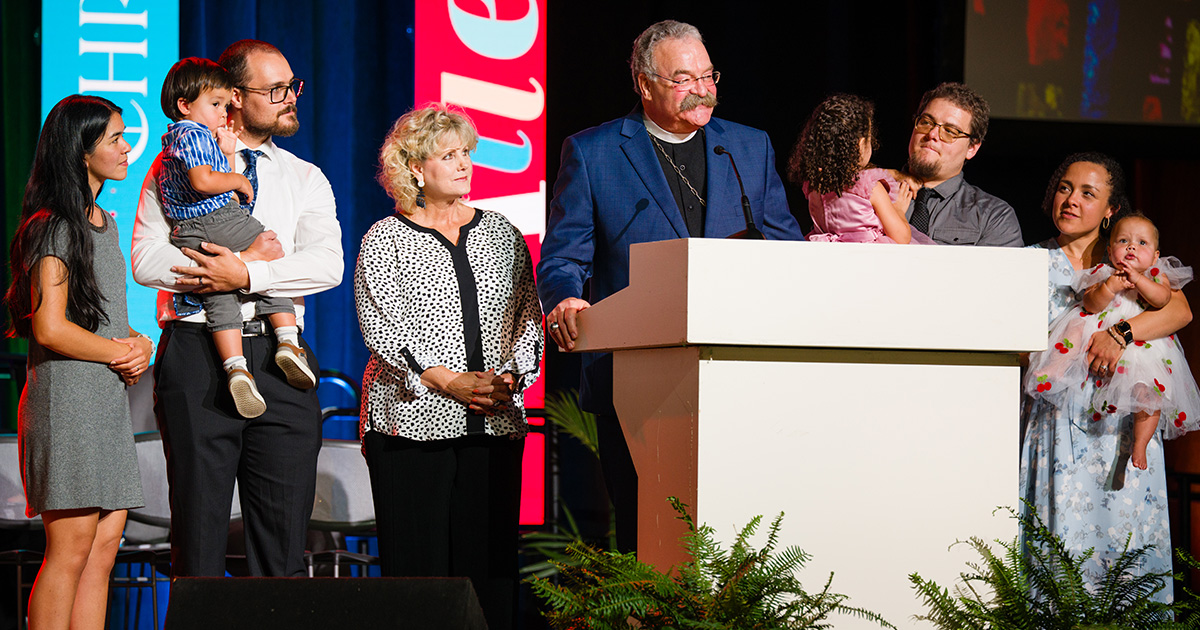 The Rev. Dr. Matthew C. Harrison, president of the LCMS, stands with his family during the 69th Regular Convention of The Lutheran Church—Missouri Synod in Phoenix on Sunday, July 19, 2026. LCMS Communications/Erik M. Lunsford
