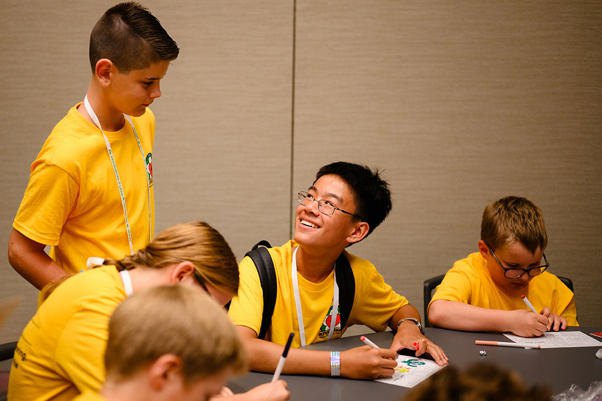 Acolytes Martin Wei and Theo Schultz of Redeemer Lutheran Church, Fort Wayne, Ind., chat as the cohort works on a service project for La Mesa Ministries in Phoenix. (LCMS/Roy S. Askins)
